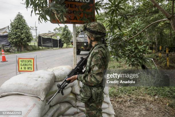 Colombian military soldiers are seen during a security operation in Saravena, Arauca, Colombia, on February 20, 2022. The National Liberation Army ,...