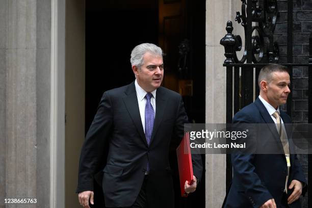 Secretary of State for Northern Ireland Brandon Lewis leaves Downing Street after Prime Minister Boris Johnson convened his cabinet before announcing...
