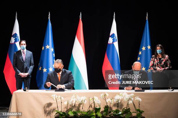 Slovenia's Prime Minister Janez Jansa and his Hungary's counterpart Viktor Orban sign a treaty on cooperation in the economic and social development...