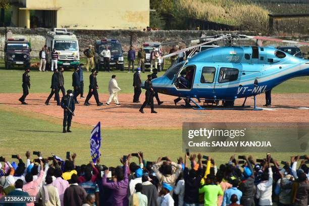 Bahujan Samaj Party chief Mayawati leaves on a helicopter after addressing an election rally in Allahabad on February 21 ahead of Uttar Pradesh state...