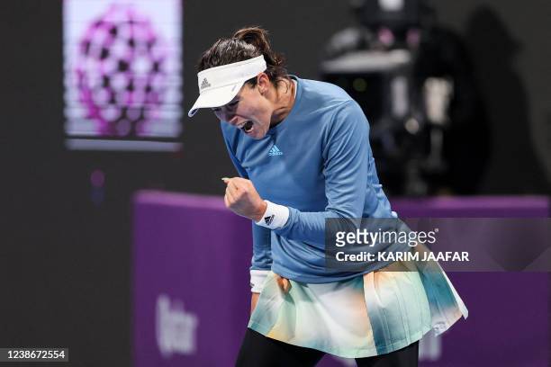 Garbine Muguruza of Spain reacts during her round of 64 tennis match of the 2022 WTA Qatar Open against Sorana Cirstea of Romania in Doha on February...