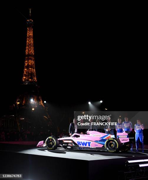 Alpine F1 team's drivers Spanish Fernando Alonso, French Esteban Ocon and Australian Oscar Piastri, pose with Technical director Matt Harman, team's...