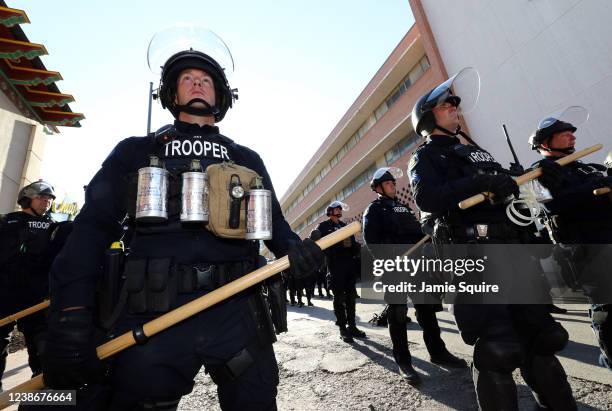 Police officers are seen in riot gear during a protest on May 31, 2020 in Kansas City, Missouri. Protests erupted around the country in response to...