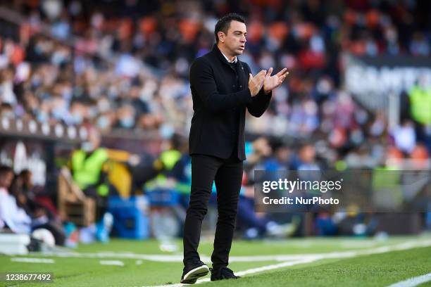 Xavi Hernandez head coach of Barcelona reacts during the LaLiga Santander match between Valencia CF and FC Barcelona at Estadio Mestalla on February...