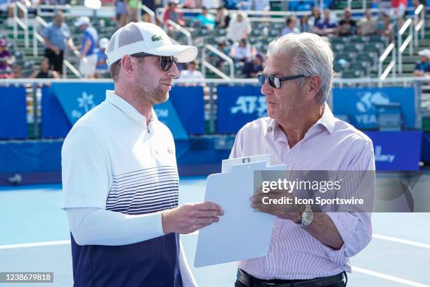 Jesse Levine speaks with Mark Baron during the ATP Delray Beach Open on February 20 at the Delray Beach Stadium & Tennis Center in Delray Beach,...