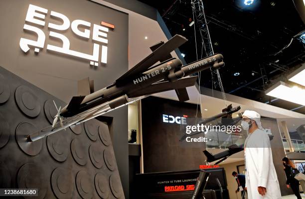 Visitor views Hunter 2-S unmanned aerial systems "swarming drones" by EDGE advanced technology group for defence on display at the UMEX Exhibition...