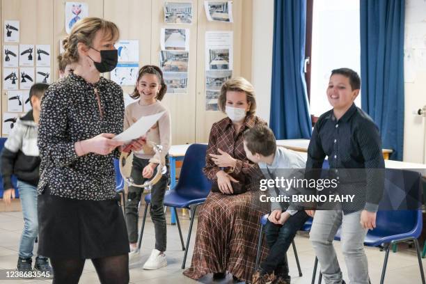 Queen Mathilde of Belgium pictured during a royal visit to the Bouge communal primary school, as part of the week against school bullying, Tuesday 22...