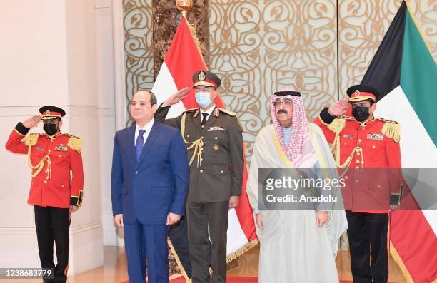 Egypt's President Abdel Fattah Al-Sisi poses for a photo with Emir of Kuwait, Sheikh Nawaf Al-Ahmad Al-Jaber Al-Sabah in Kuwait City, Kuwait on...