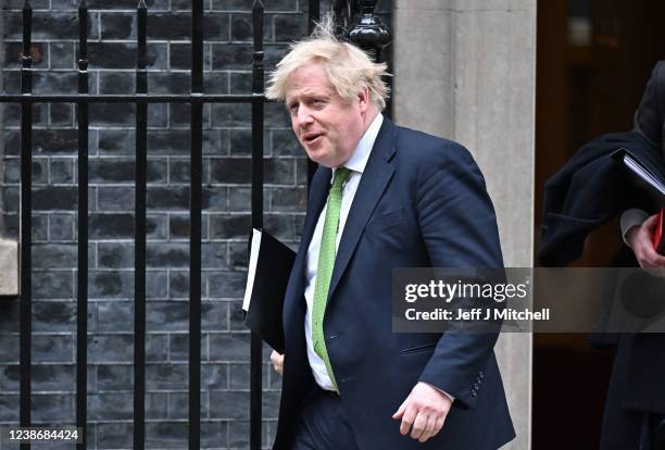 British Prime Minister Boris Johnson leaves 10 Downing Street to address the House of Commons on February 22, 2022 in London, England. Early this...