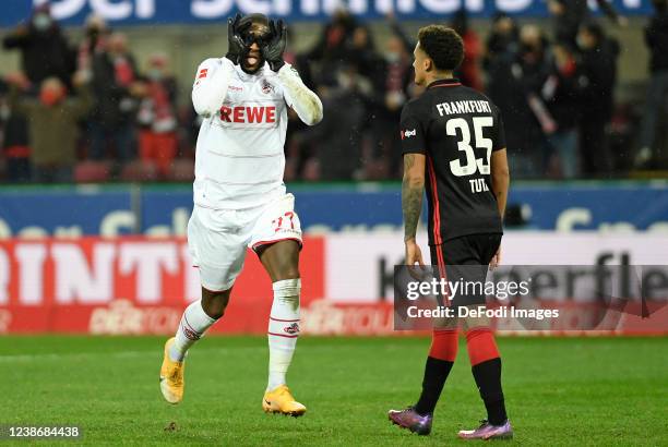 Anthony Modeste of 1. FC Koeln celebrates after scoring his teams first goal during the Bundesliga match between 1. FC Köln and Eintracht Frankfurt...