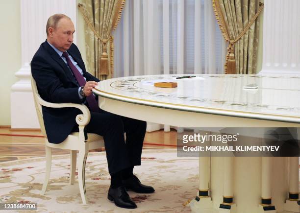 Russian President Vladimir Putin attends a meeting with his Azerbaijani counterpart at the Kremlin in Moscow on February 22, 2022.