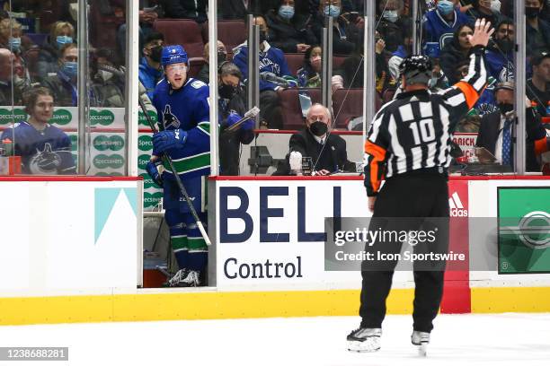 Vancouver Canucks Right Wing Brock Boeser talks to referee Kyle Rehman as Rehman calls a penalty on Boeser as the Canucks play the Anaheim Ducks...