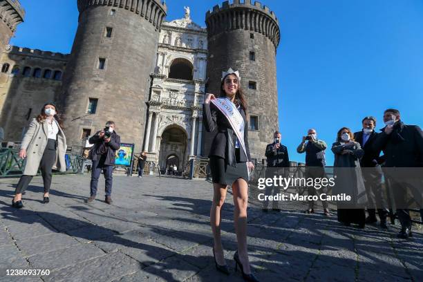 The newly elected to the Miss Italia 2021 beauty contest, Zeudi Di Palma, poses for a photo in front of Castel Nuovo before the ceremony to celebrate...
