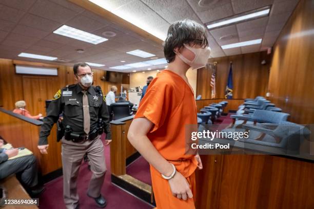 Ethan Crumbley is led away from the courtroom after a placement hearing at Oakland County Circuit Court on February 22, 2022 in Pontiac, Michigan....