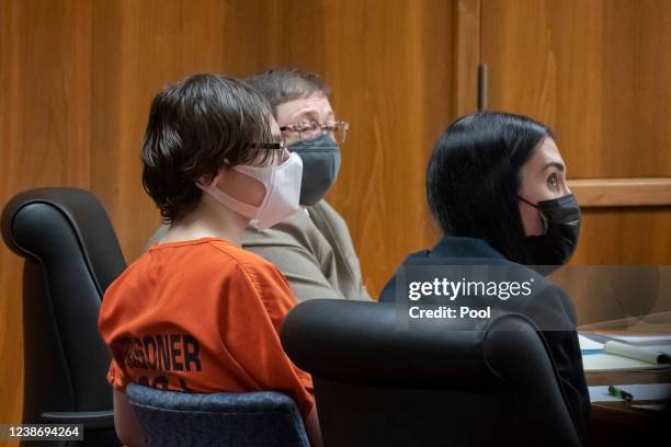 Ethan Crumbley and his defense attorneys Amy Hopp and Paulette Loftin attend a placement hearing at Oakland County Circuit Court on February 22, 2022...
