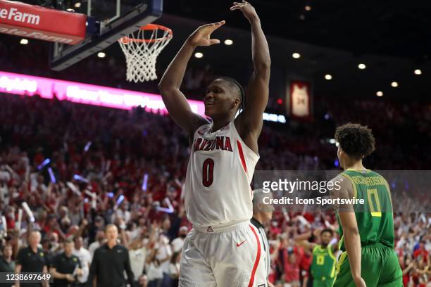 Arizona Wildcats guard Bennedict Mathurin, encourages the crowd to make some noise, during a Pac-12 basketball game between the Oregon Ducks and the...