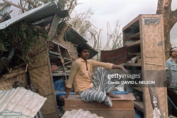 Bangladeshi man sits on April 30 in Saturia, as the huts of his village were reduced to scraps during a severe tornado on April 26. Bangladesh...