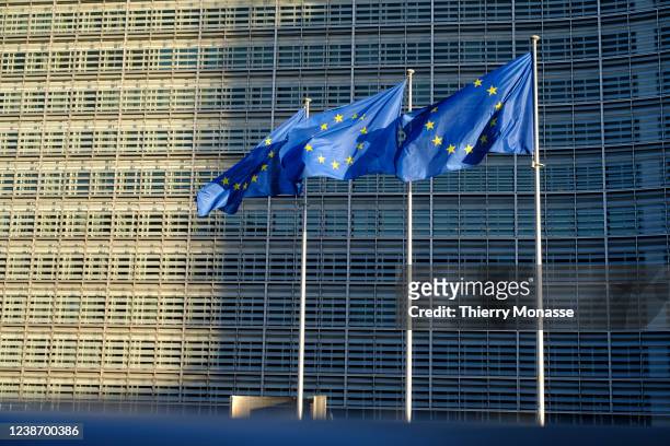 Flags fly outside the Berlaymont, the headquarters of the EU Commission, on February 23, 2022 in Brussels, Belgium.