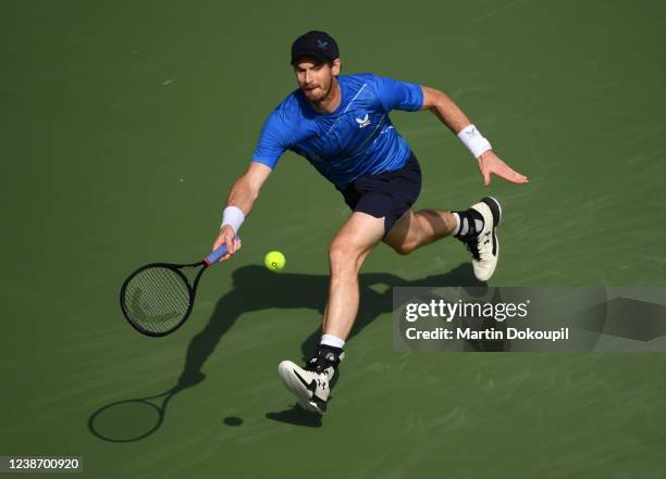 Andy Murray of Britain returns the ball in the second round match against Jannik Sinner of Italy during day 10 of the Dubai Duty Free Tennis at Dubai...