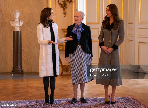 Catherine, Duchess of Cambridge is welcomed by Queen Margrethe II and Crown Princess Mary of Denmark during an audience at Christian IX's Palace on...