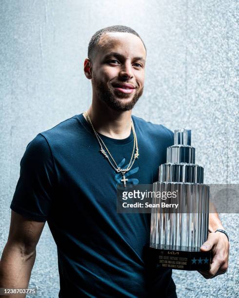 Stephen Curry of the Golden State Warriors poses for a portrait with the Kia NBA All-Star MVP Kobe Bryant Trophy after the 71st NBA All-Star Game as...