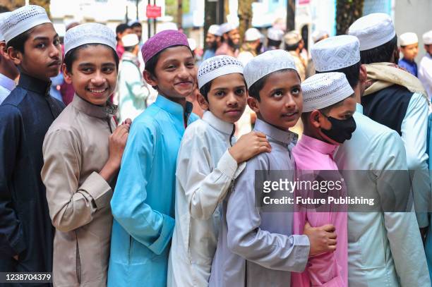 Students of Jamia Qasimul Uloom Hazrat Shahjalal make queue to receive the first dose of Pfizer vaccine at the Islamic Madrasa. On February 22, 2022...