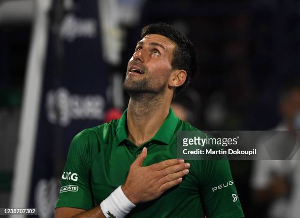 Novak Djokovic of Serbia reacts after beating Karen Khachanov of Russia in the second round match during day 10 of the Dubai Duty Free Tennis at...