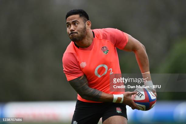 Manu Tuilagi of England lines up a pass during a training sesssion at Pennyhill Park on February 22, 2022 in Bagshot, England.