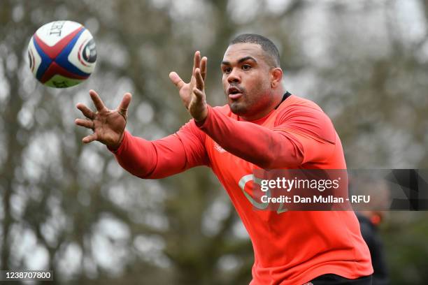 Kyle Sinckler of England receives a pass during a training sesssion at Pennyhill Park on February 22, 2022 in Bagshot, England.