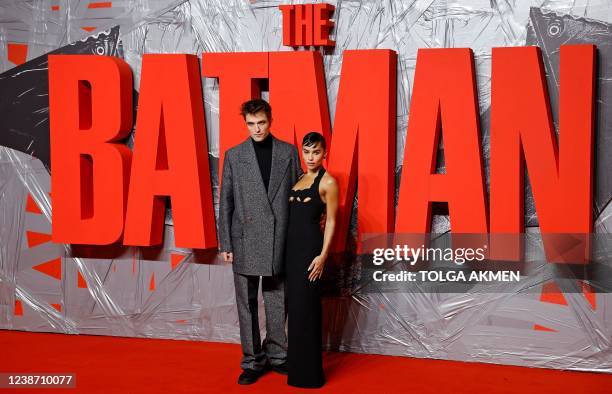 British actor Robert Pattinson and US actress Zoe Kravitz pose on the red carpet upon arrival for a special screening for the movie "The Batman" at...