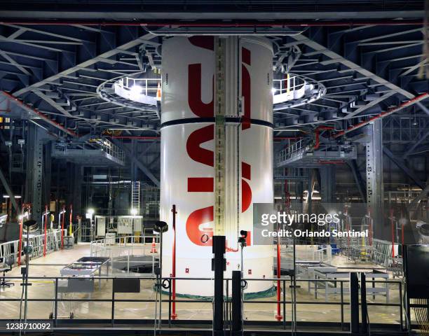 In this view inside the Vehicle Assembly Building at Kennedy Space Center in Florida in March, work continues on the &quot;stack&quot; of the two,...