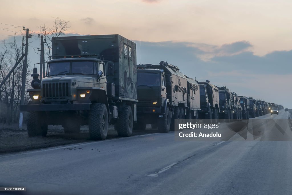A convoy of Russian military vehicles moving towards border in Donbas region