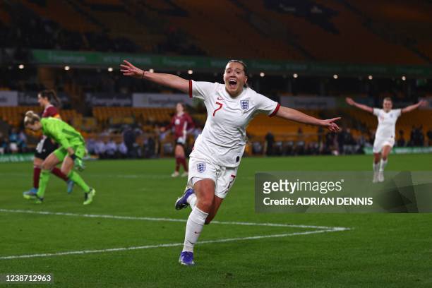 England's striker Fran Kirby celebrates scoring the team's third goal during the Arnold Clark Cup women's international football match between...