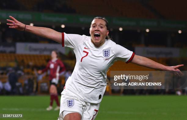 England's striker Fran Kirby celebrates scoring the team's third goal during the Arnold Clark Cup women's international football match between...