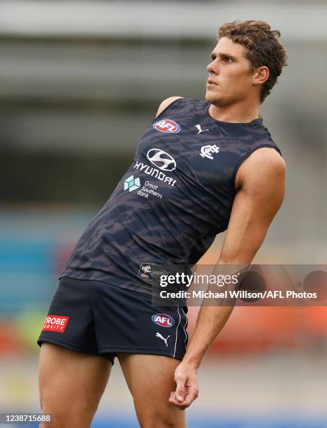 Charlie Curnow of the Blues looks on at a shot on goal during an AFL practice match between the Carlton Blues and the St Kilda Saints at Ikon Park on...