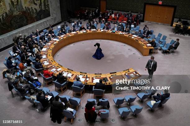Ukraine Permanent Representative to the United Nations Sergiy Kyslytsya walks to his seat during an emergency meeting of the UN Security Council on...