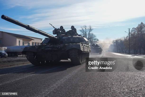 Tanks of Ukrainian forces move following Russia's military operation on February 24 in Chuhuiv, Kharkiv Oblast, Ukraine.