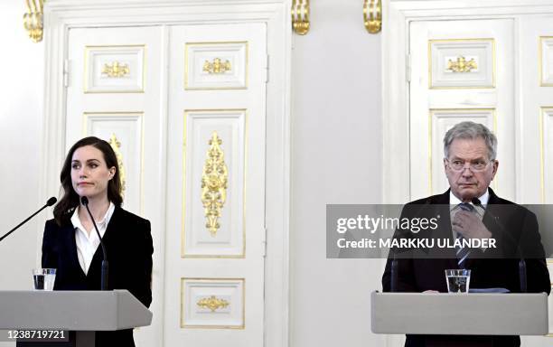 Finland's President Sauli Niinistö and Finland's Prime Minister Sanna Marin address a press conference on Russia's invasion of Ukraine in Helsinki,...