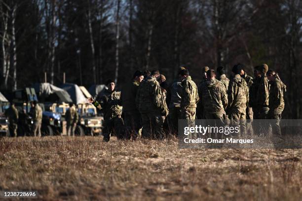 Army soldiers assigned to the 82nd Airborne Division are seen inside an operating base at the Arlamow Airport on February 24, 2022 in Wola...