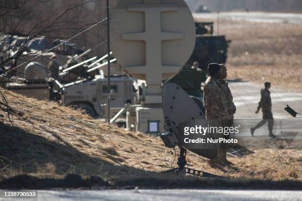 American soldiers sent to the Polish-Ukrainian border in connection with the crisis in Ukraine stand near radar near arlamow on February 24, 2022.