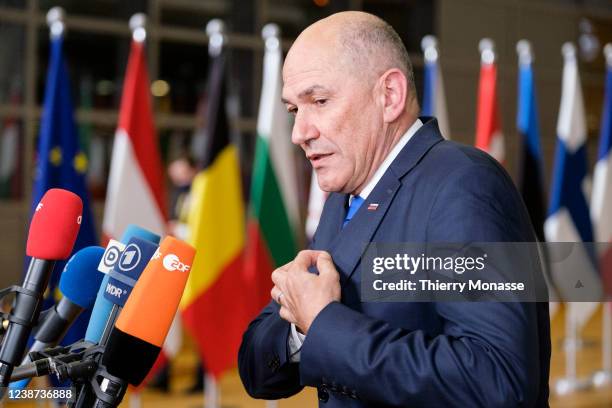 Slovenian Prime Minister Janez Jansa is talking to media as he arrives in the Europa, the EU Council headquarter for an EU Summit on the situation of...