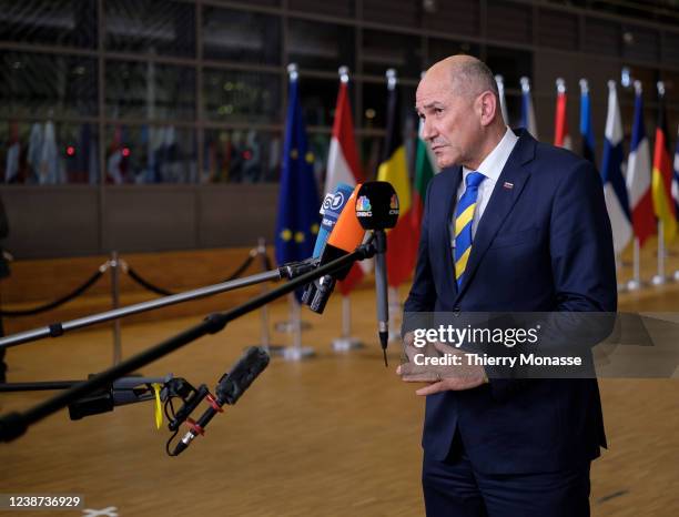 Slovenian Prime Minister Janez Jansa is talking to media as he arrives in the Europa, the EU Council headquarter for an EU Summit on the situation of...