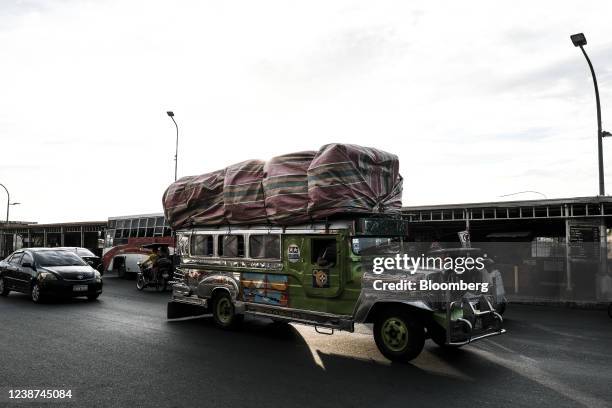 Jeepney carrying passengers and goods on a highway in Tarlac City, the Philippines, on Wednesday, Feb. 23, 2022. Global food inflation could surge to...