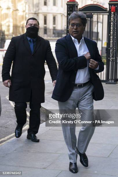 Lalit Modi, a businessman who founded the Indian Premier League cricket, arrives at the Rolls Building at the High Court in London, where he is being...