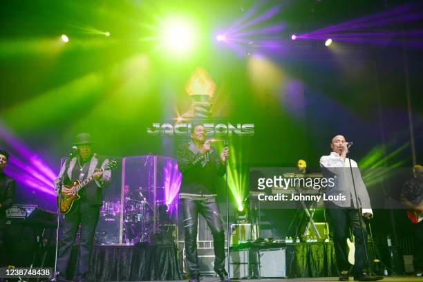 Tito Jackson, Marlon Jackson and Jackie Jackson of the Jacksons perform on stage at Live at Coco Seminole Casino Outdoors on February 24, 2022 in...