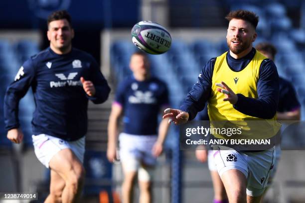 Scotland's Ali Price takes part in a training session of Scotland's rugby team at the Murrayfield Stadium, in Edinburgh, on February 25, 2022 on the...