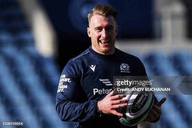 Scotland's full-back Stuart Hogg reacts as he takes part in a training session of Scotland's rugby team at the Murrayfield Stadium, in Edinburgh, on...