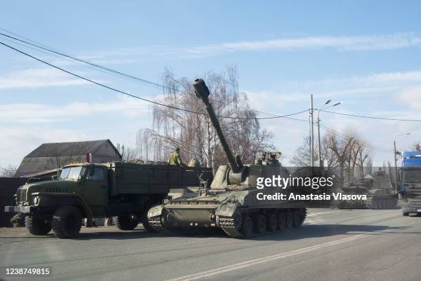 Military vehicles are seen along a street on February 25, 2022 in Kyiv, Ukraine. Yesterday, Russia began a large-scale attack on Ukraine, with...