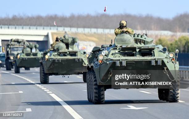 Armoured military vehicles of the Hungarian Army drive along the M4 highway close to Vasarosnameny, Hungary, some 290 km from Hungarian capital on...