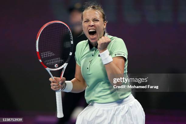 Anett Kontaveit of Estonia celebrates after winning against Jelena Ostapenko of Latvia during the Qatar TotalEnergies Open - semi-final at at Khalifa...